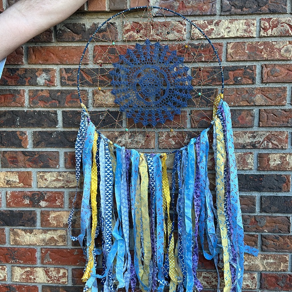 Handcrafted Blue Dreamcatcher with Yellow Accents
